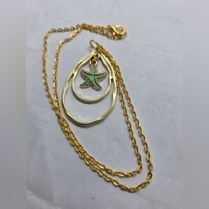 Gold Tone Starfish Pendant Necklace - Green Accent